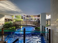 Pool with swim up bar