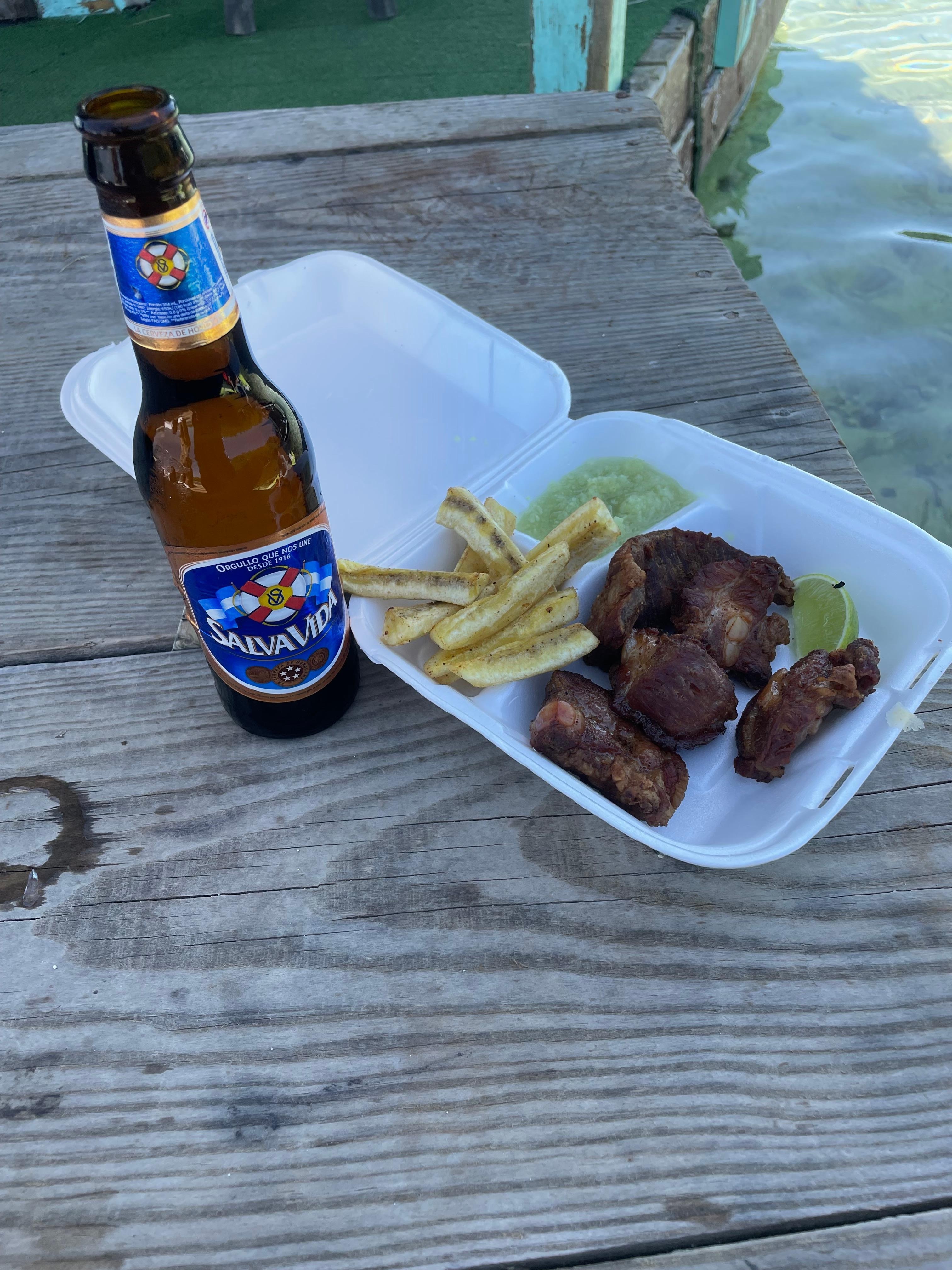 Fried pork plantains and ahh some good salsa
$2 beer from floating bar
