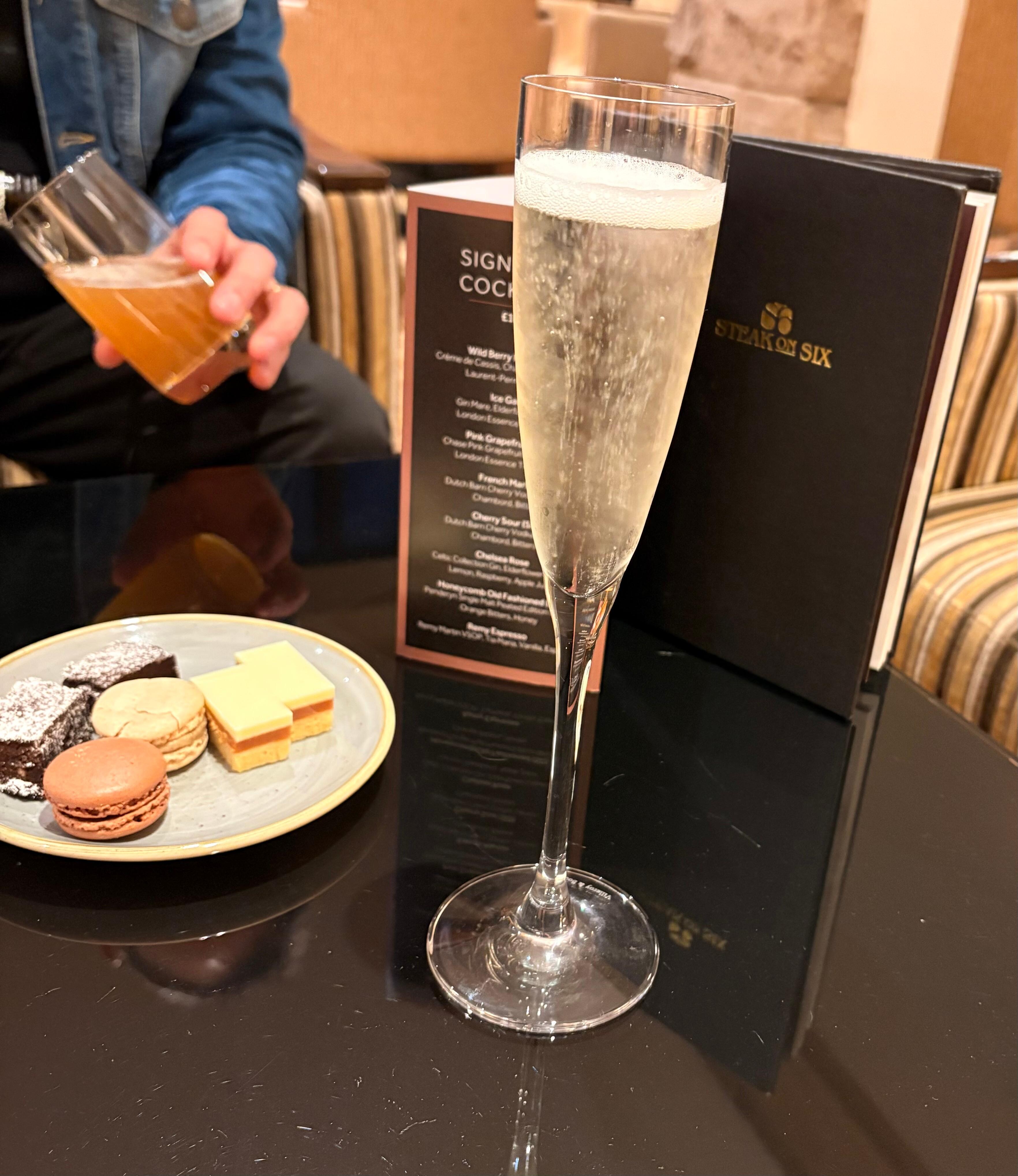 Bar on sixth with complementary Prosecco and sweet treats. 