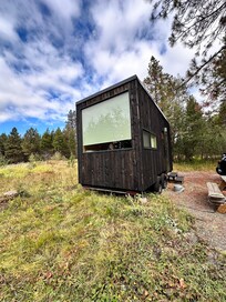 Outside the tiny cabin Harold