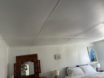 The ceiling in the main bedroom looked like it was about to fall down.