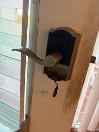 Wires hanging from nonfunctioning lock