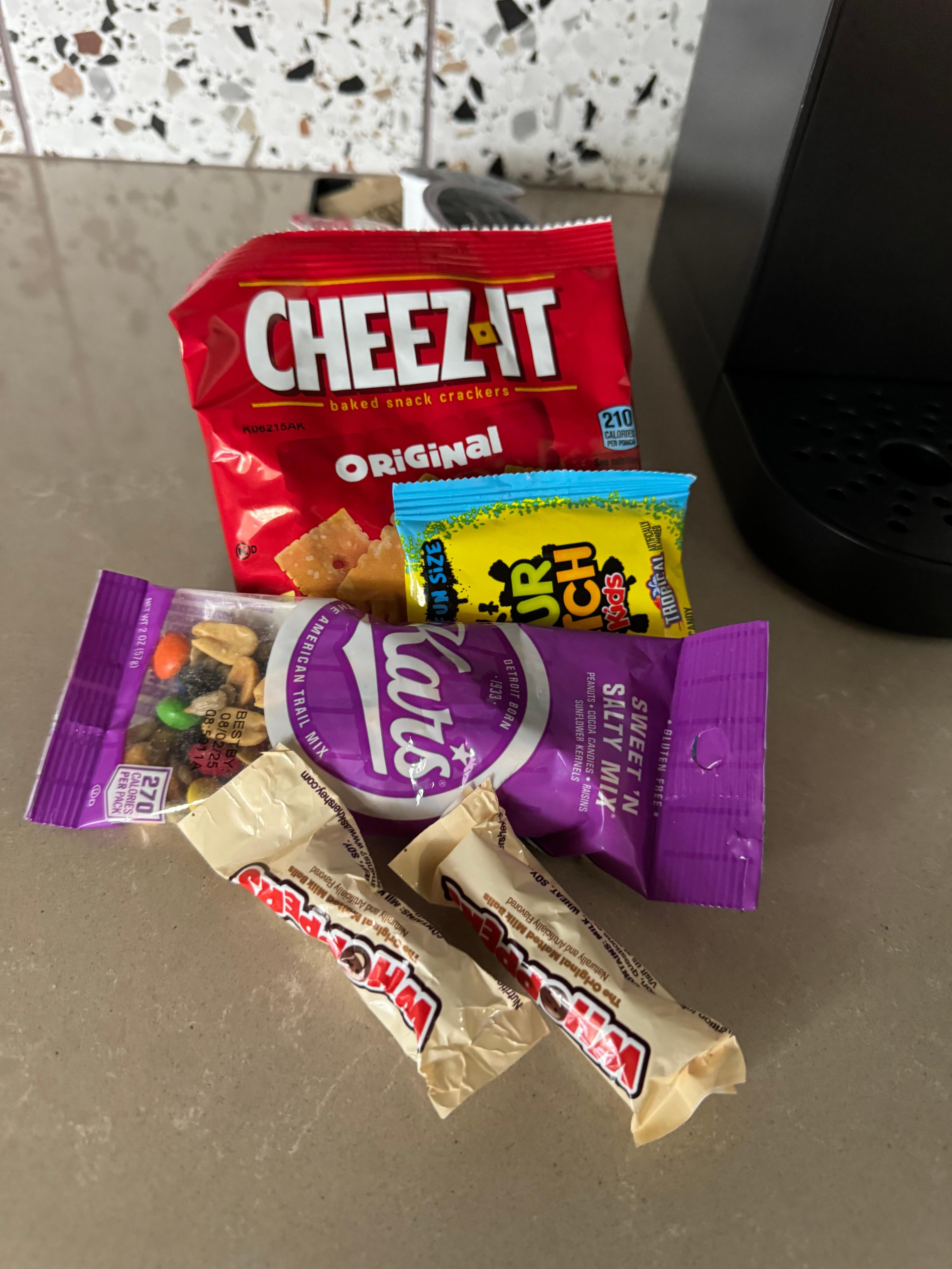 The snacks next to the coffee machine