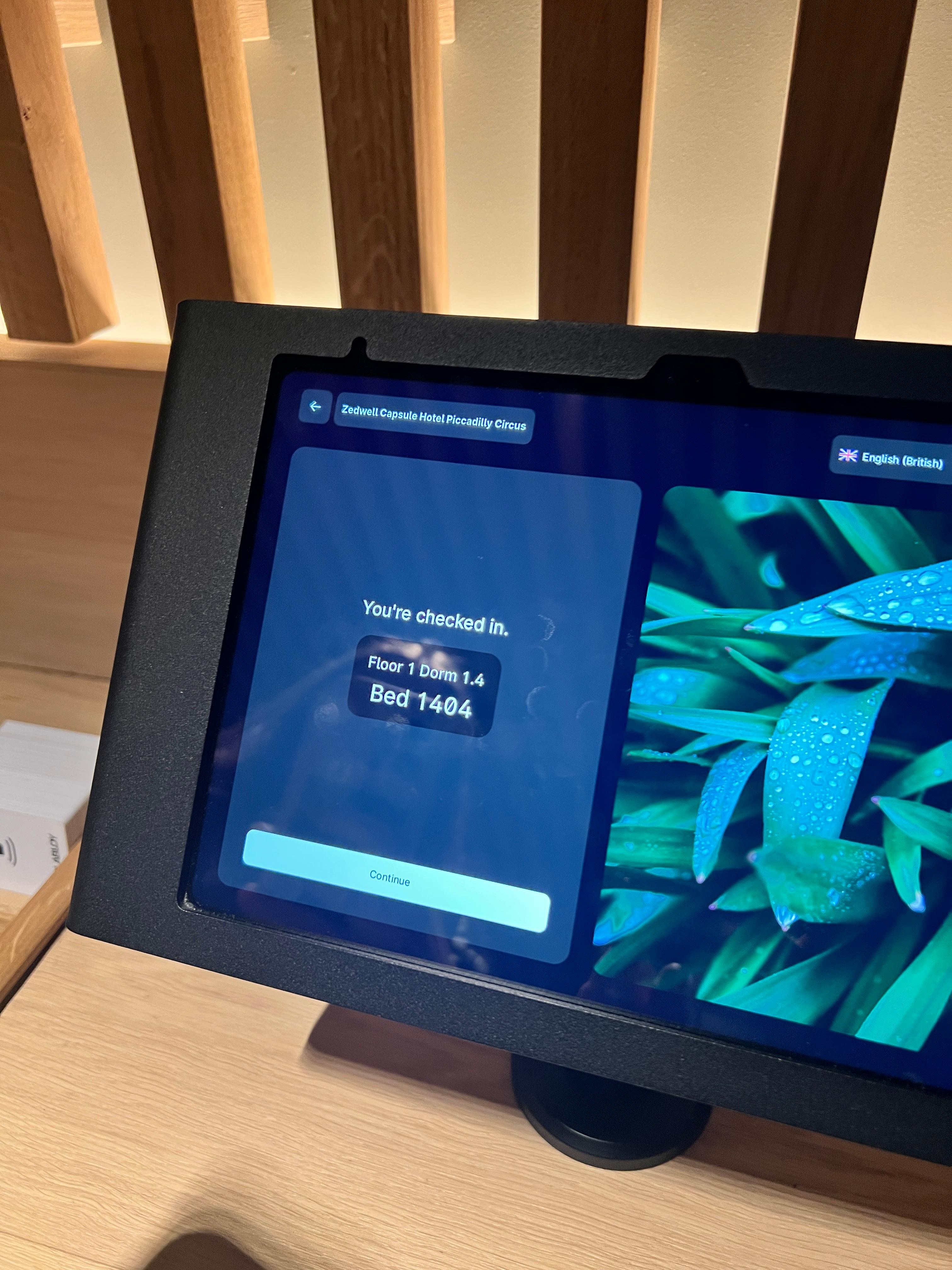 Self check in and checkout. When you have entered your details, pick up a room card  and place on the unit to encode with access information.  