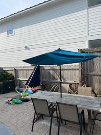 Table umbrella that needs to be replaced