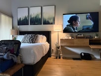 Comfy bed with view and big TV