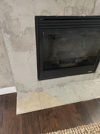 Chunks of the fireplace coming off