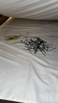 Literally what we found under our bed (zip ties and a pocket knife)