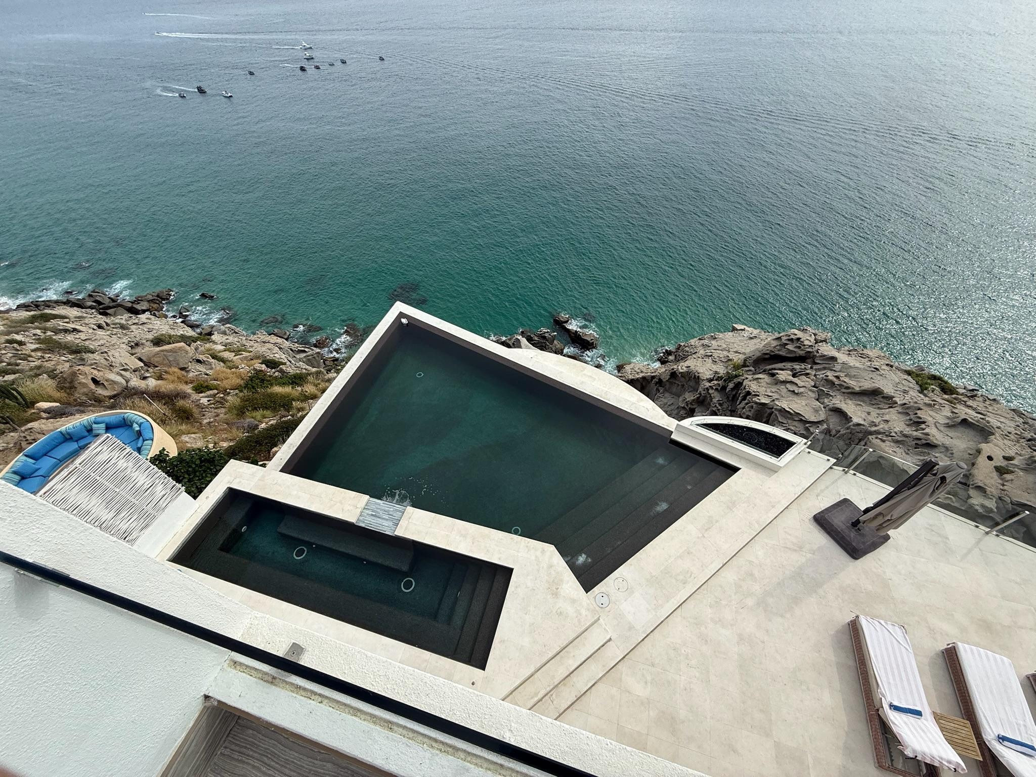 Looking down at the hot tub and pool.  