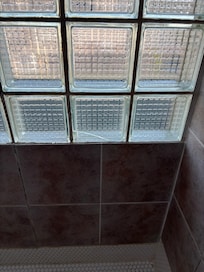 Glass block has a crack.