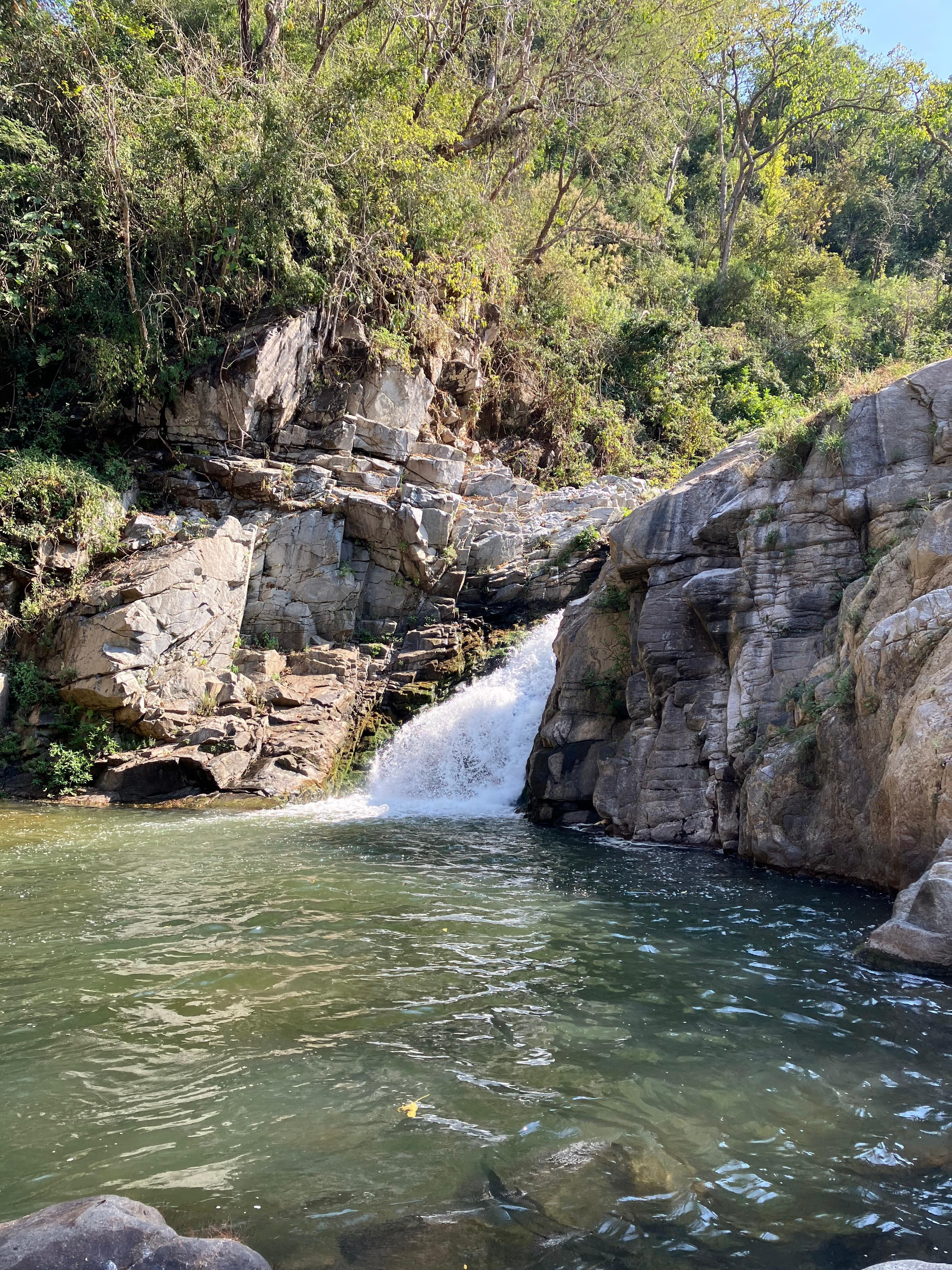 The waterfall where you can take a dip