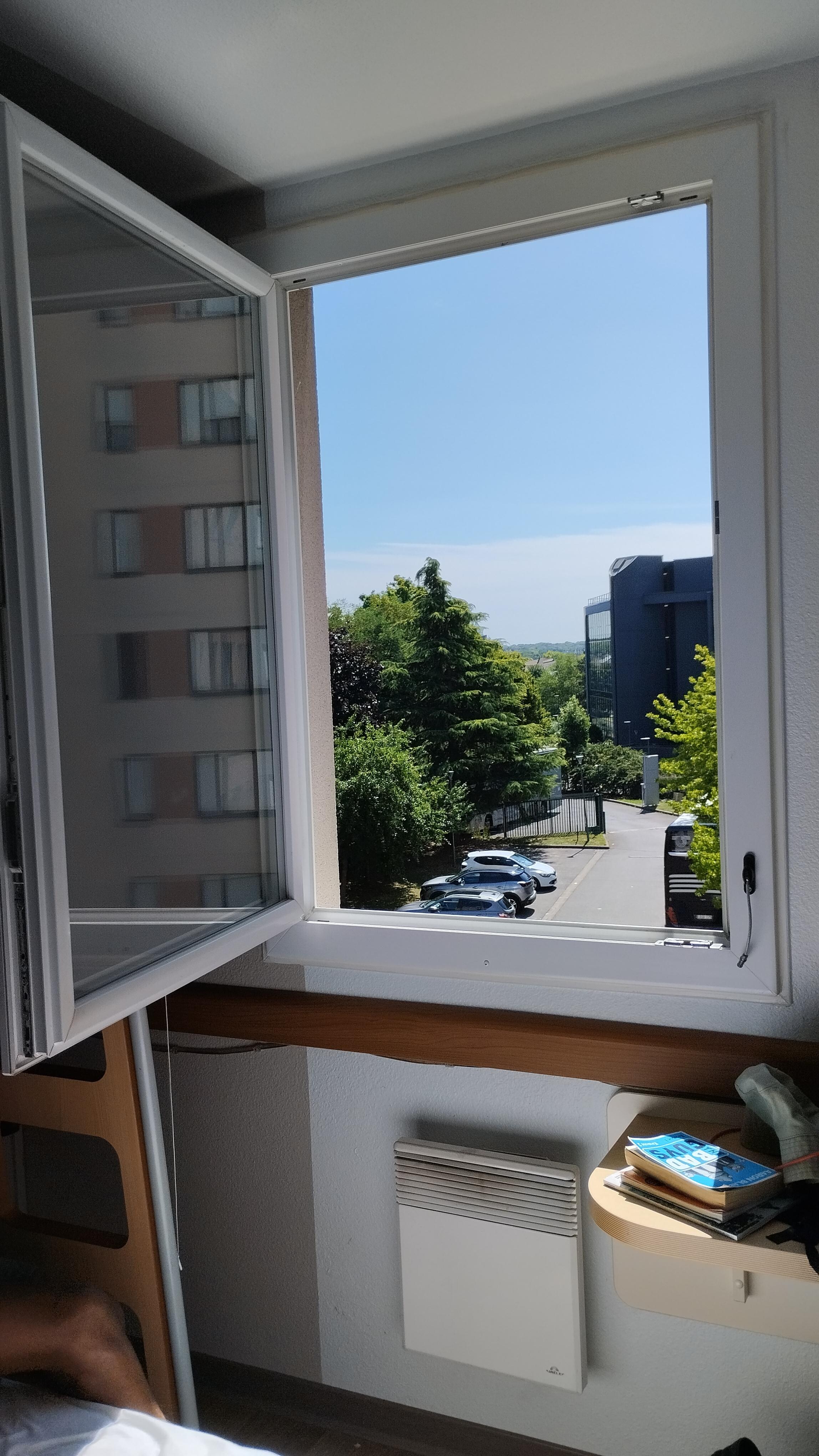 Window wide open on third floor as catch broken