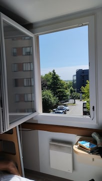 Window wide open on third floor as catch broken