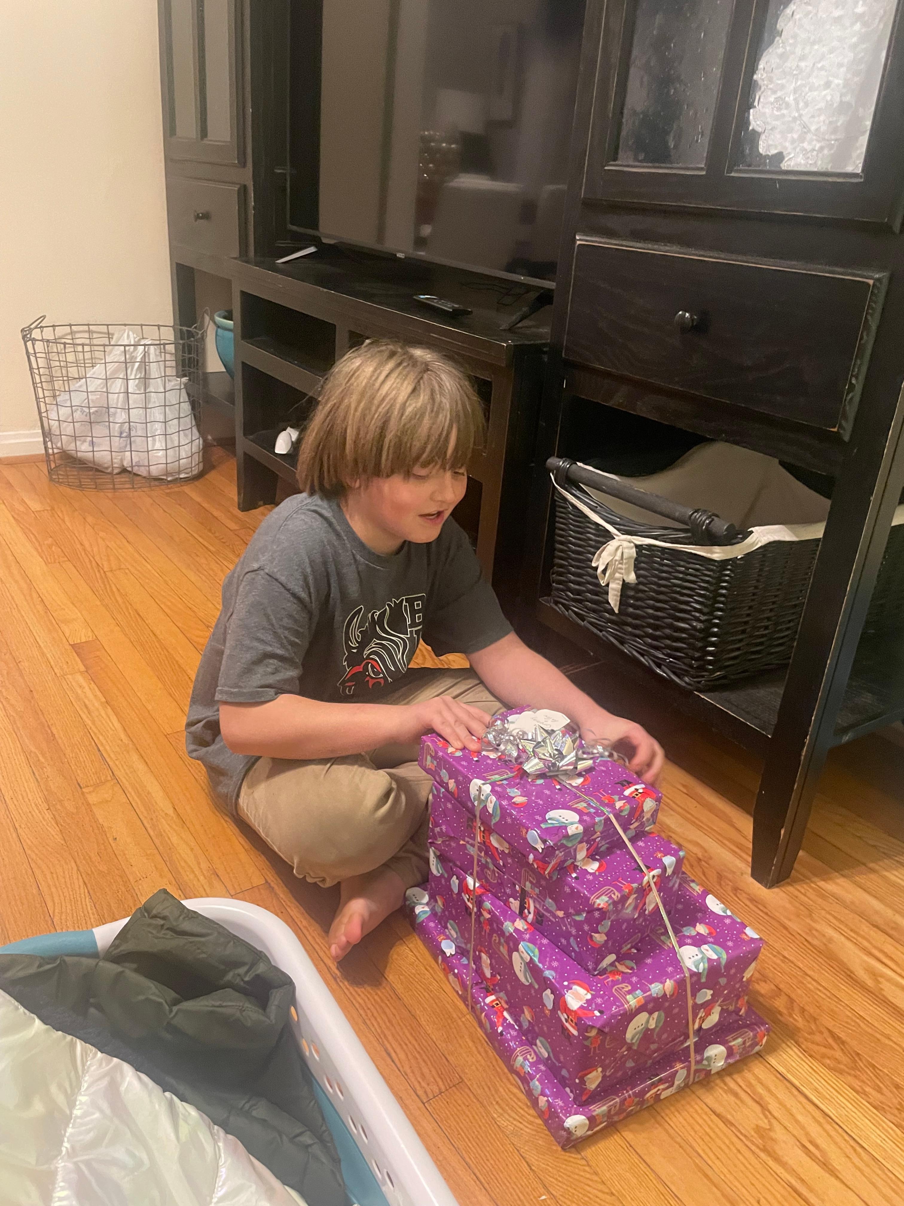 Christmas - there was room on the sectional but he wanted space to open presents.