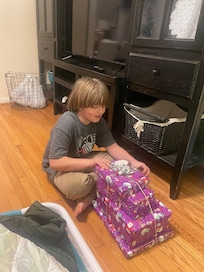 Christmas - there was room on the sectional but he wanted space to open presents.