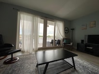 Nice room set up; curtains a little dirty.