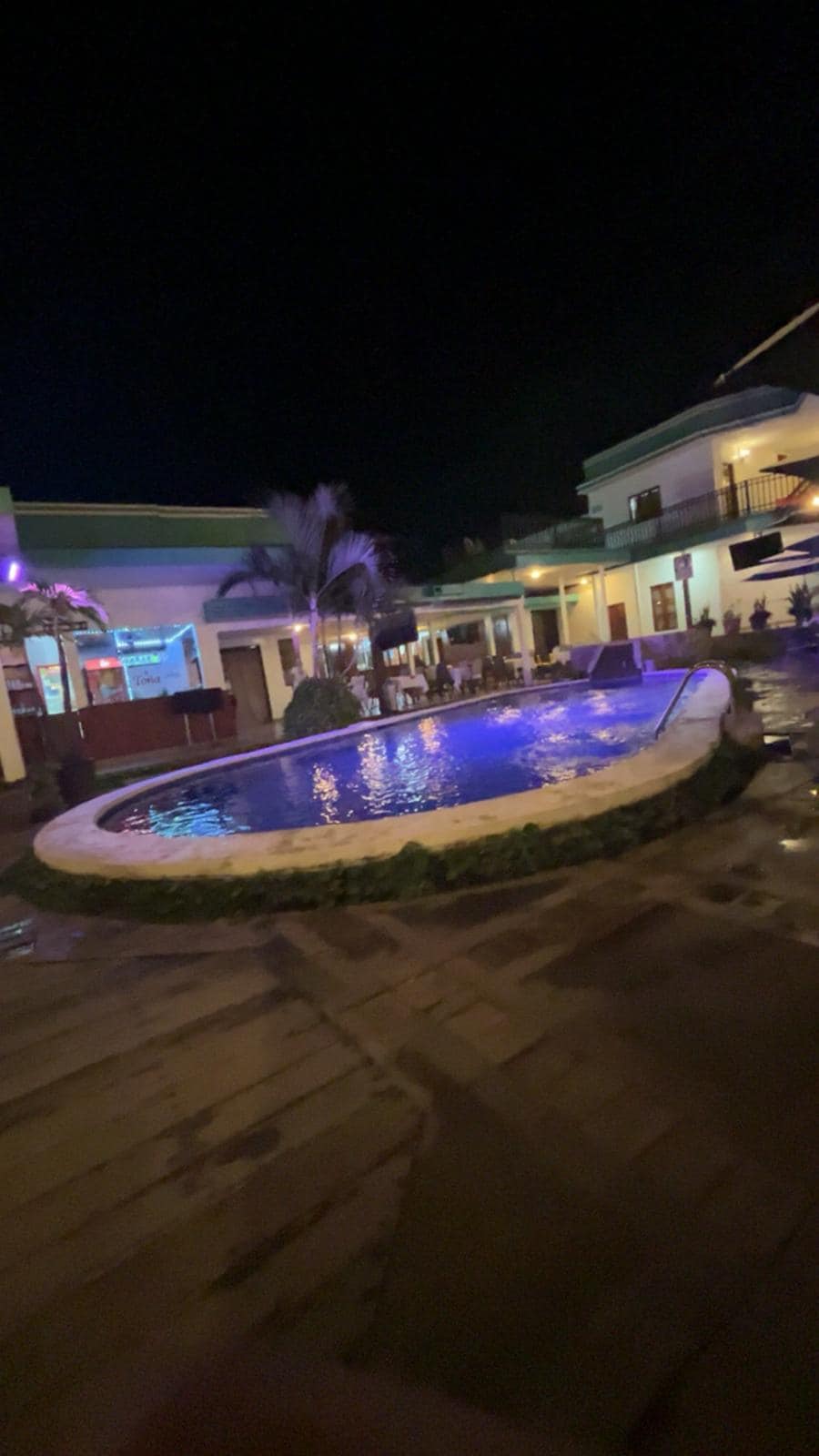 Pool with bar at night