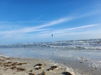 Kite surfer in the distance. It was fun to watch them catch big air on their jumps.