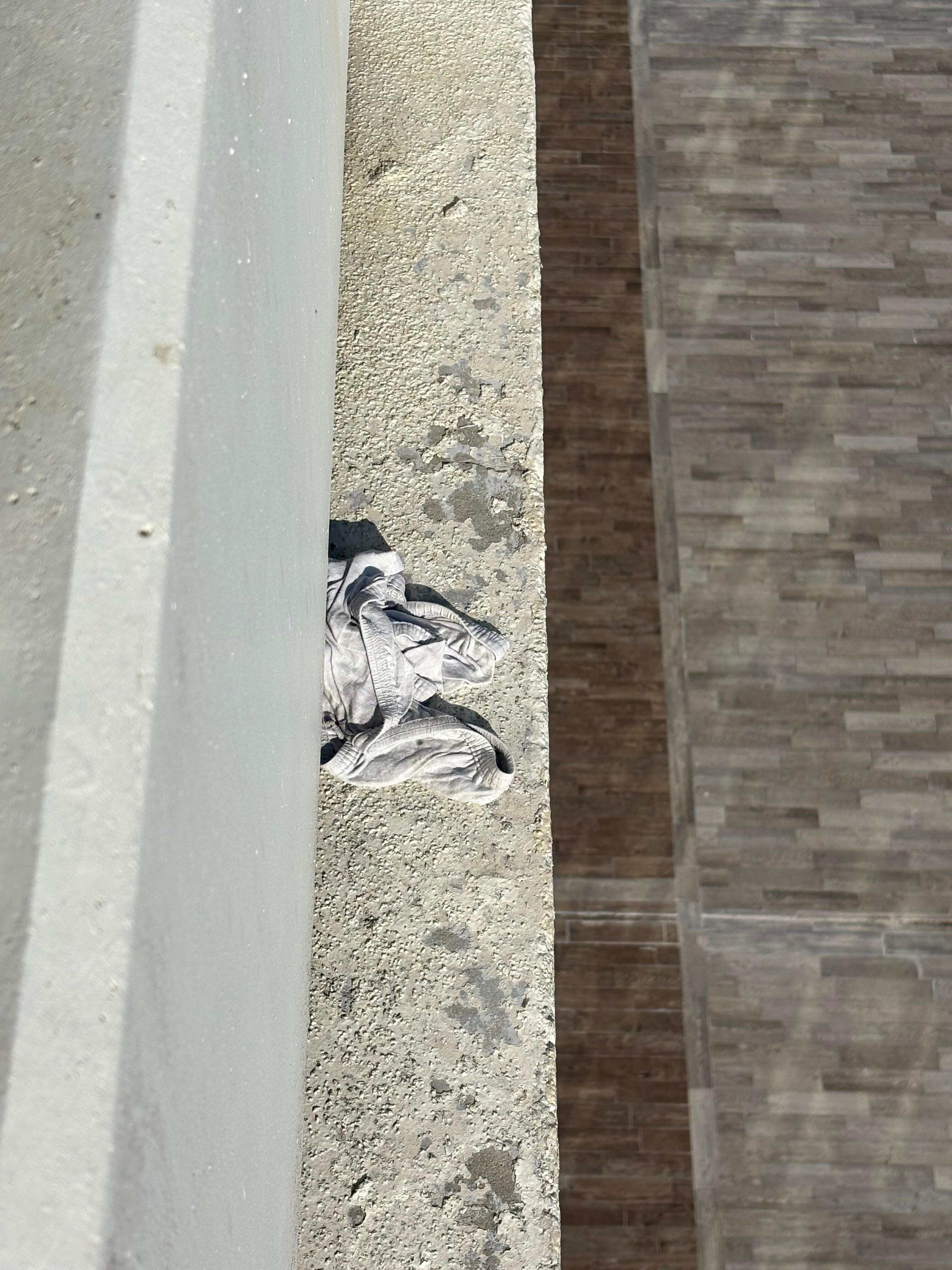 Outside of our dirt glass siding doors for our ocean view