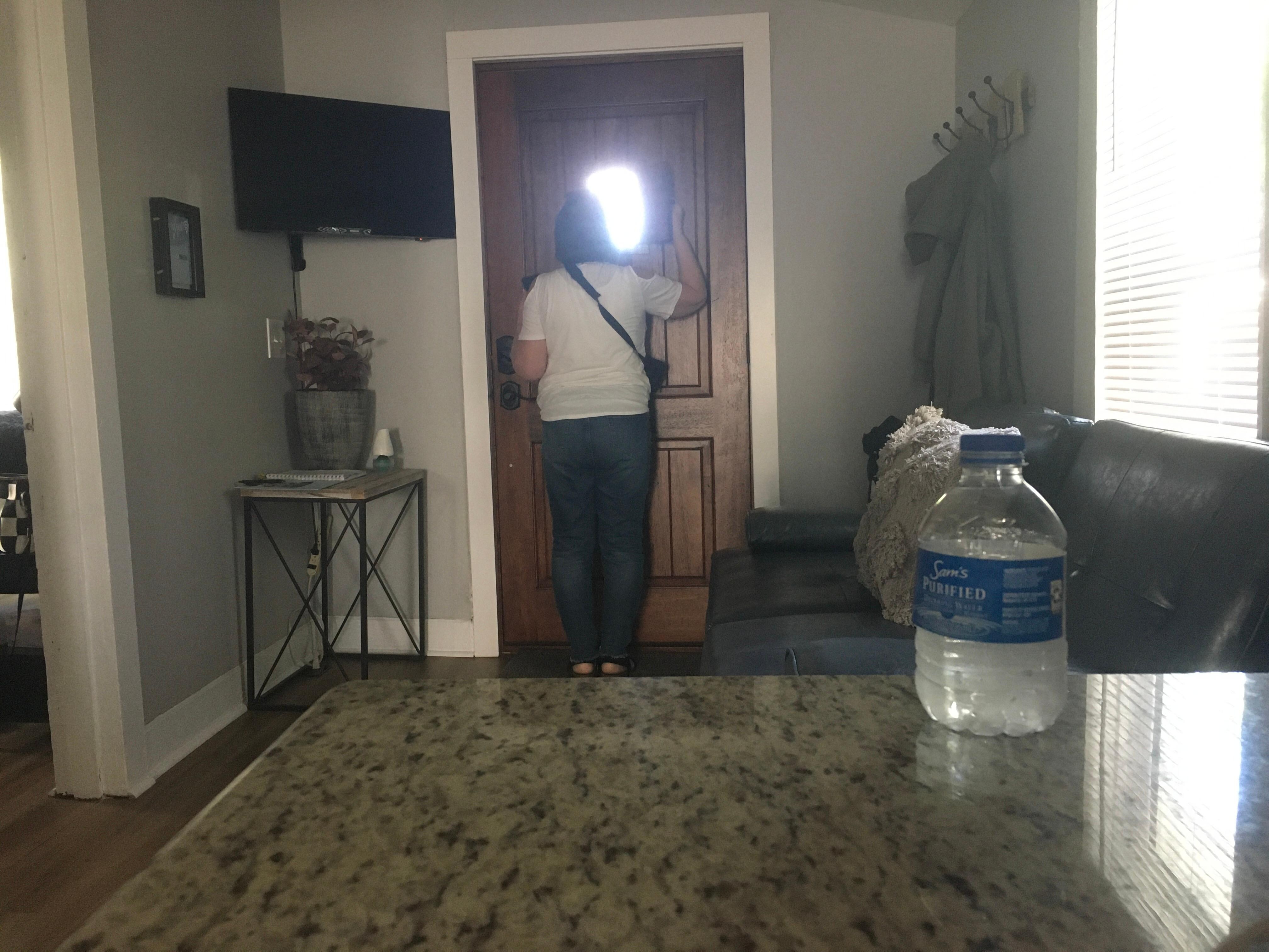 She loved looking out the peep hole!  