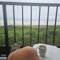 Early morning coffee while listening to the waves. Nothing better