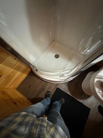 The shower door off the tracks right after arriving