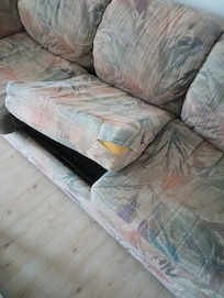 Disgusting, falling apart couch