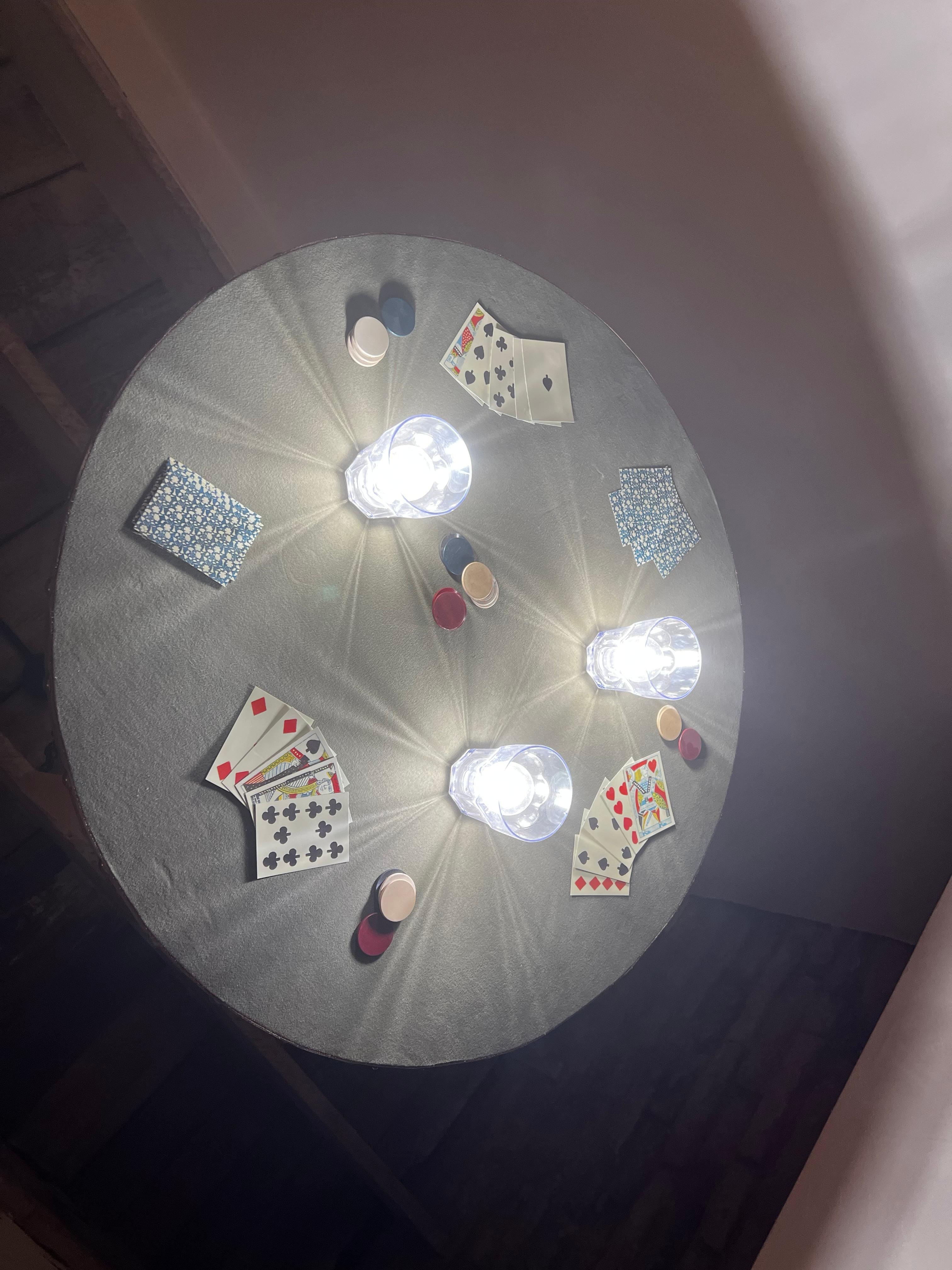 This upside down card table was made into a hanging light.