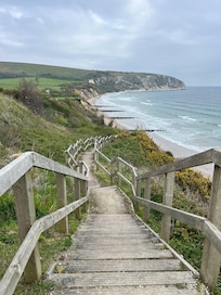 Access from hotel to the beach below, many steps