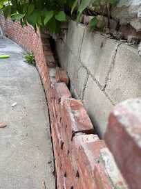 Unsecured brick wall