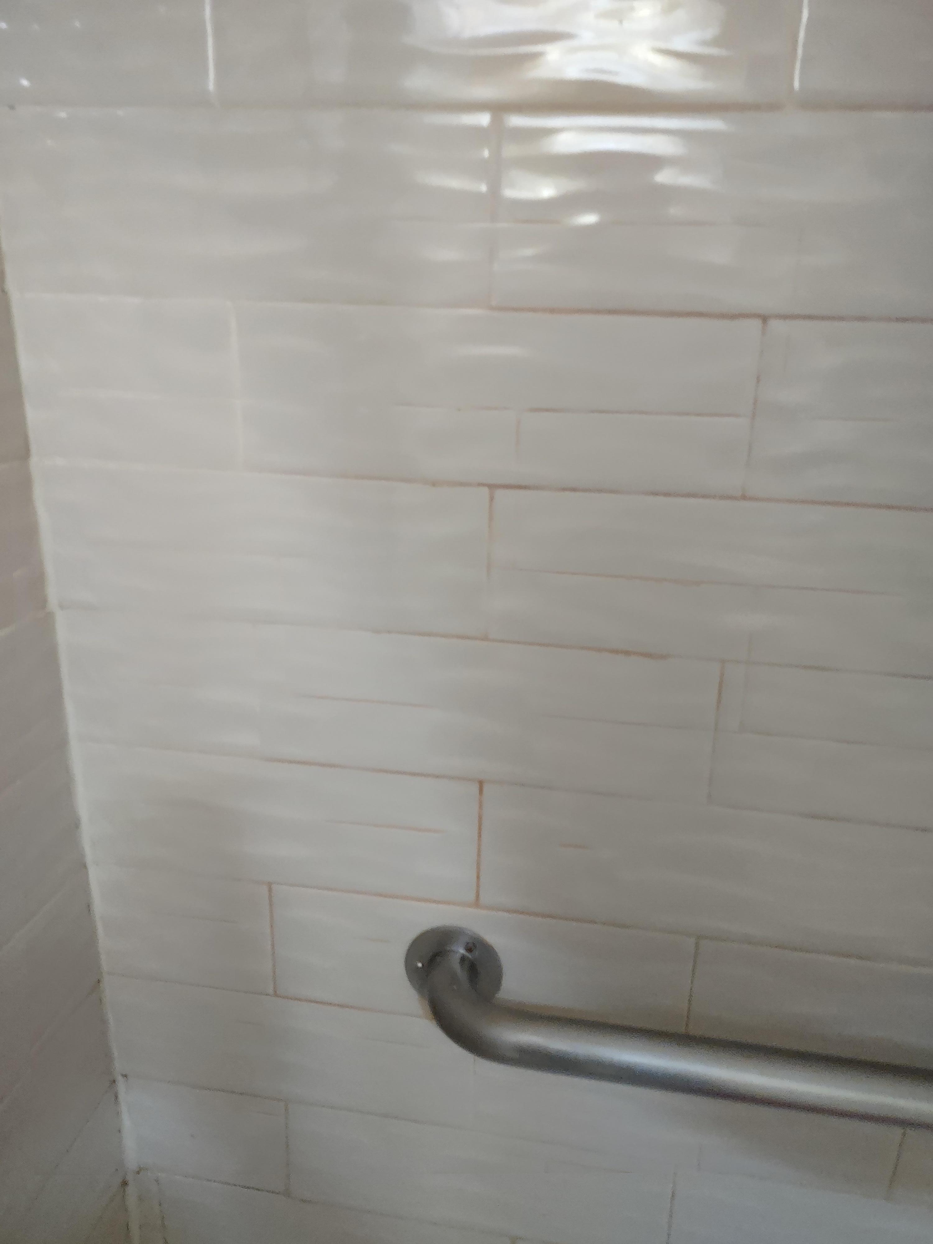 More pink mold in the grout