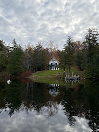 View from a kayak in the lake back to the house