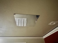 Cheap mirror above bed