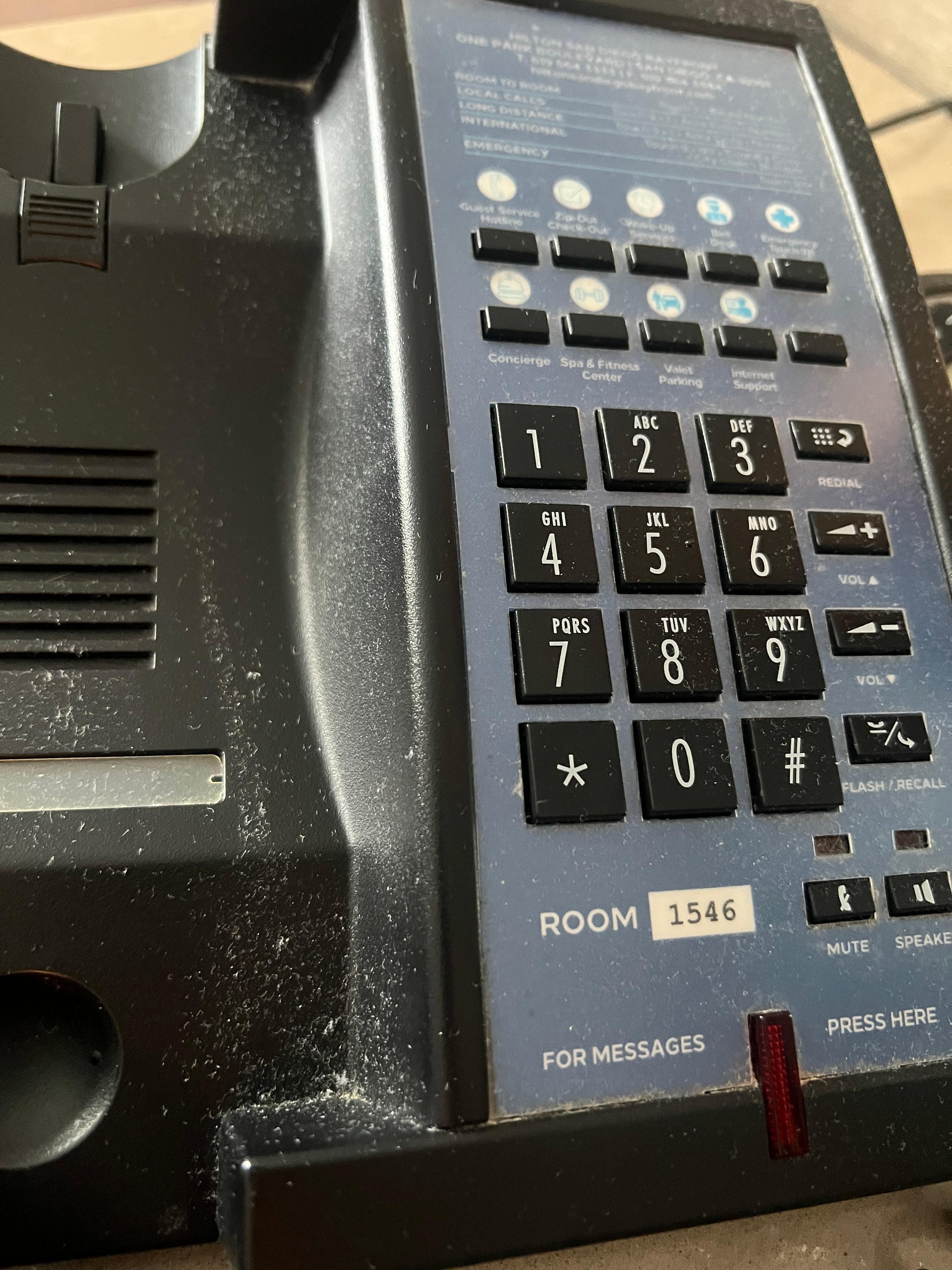 Dusty phone in room. Gross