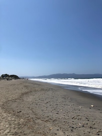 Beach view, this is the sandy area accessible by turning right on the local beach and walking a few mins