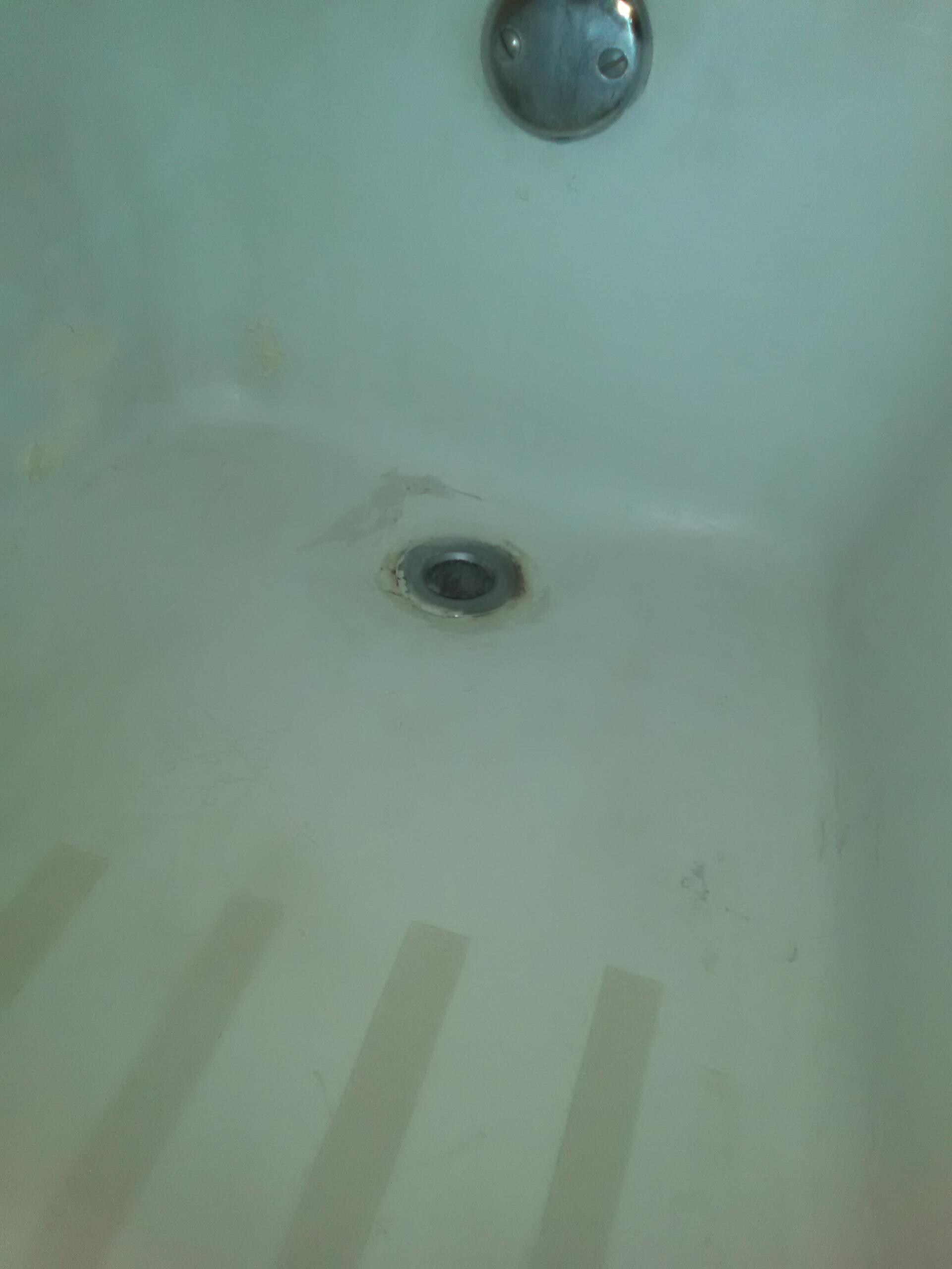 paint chipping left of drain