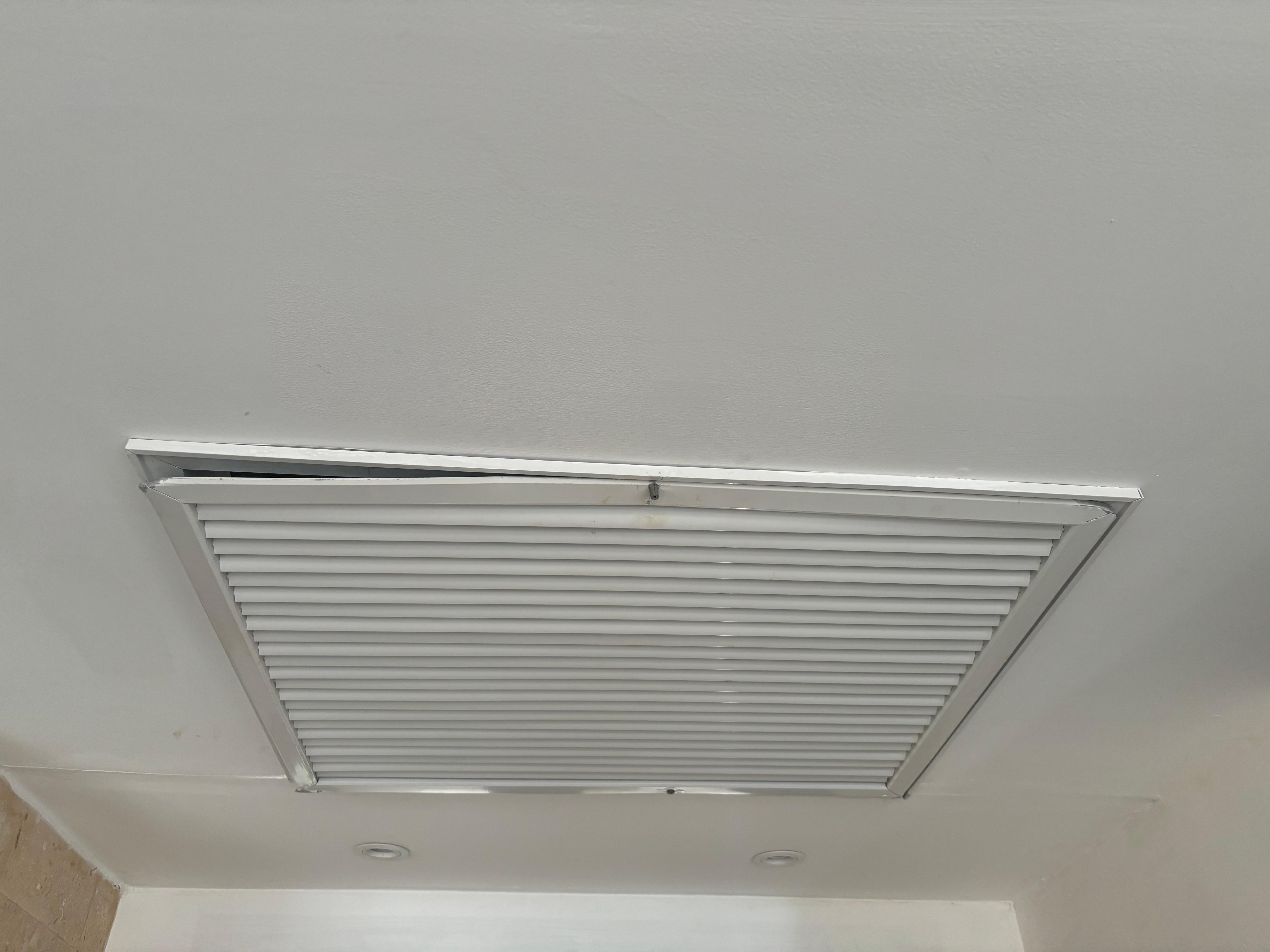 Air conditioning cover hanging down