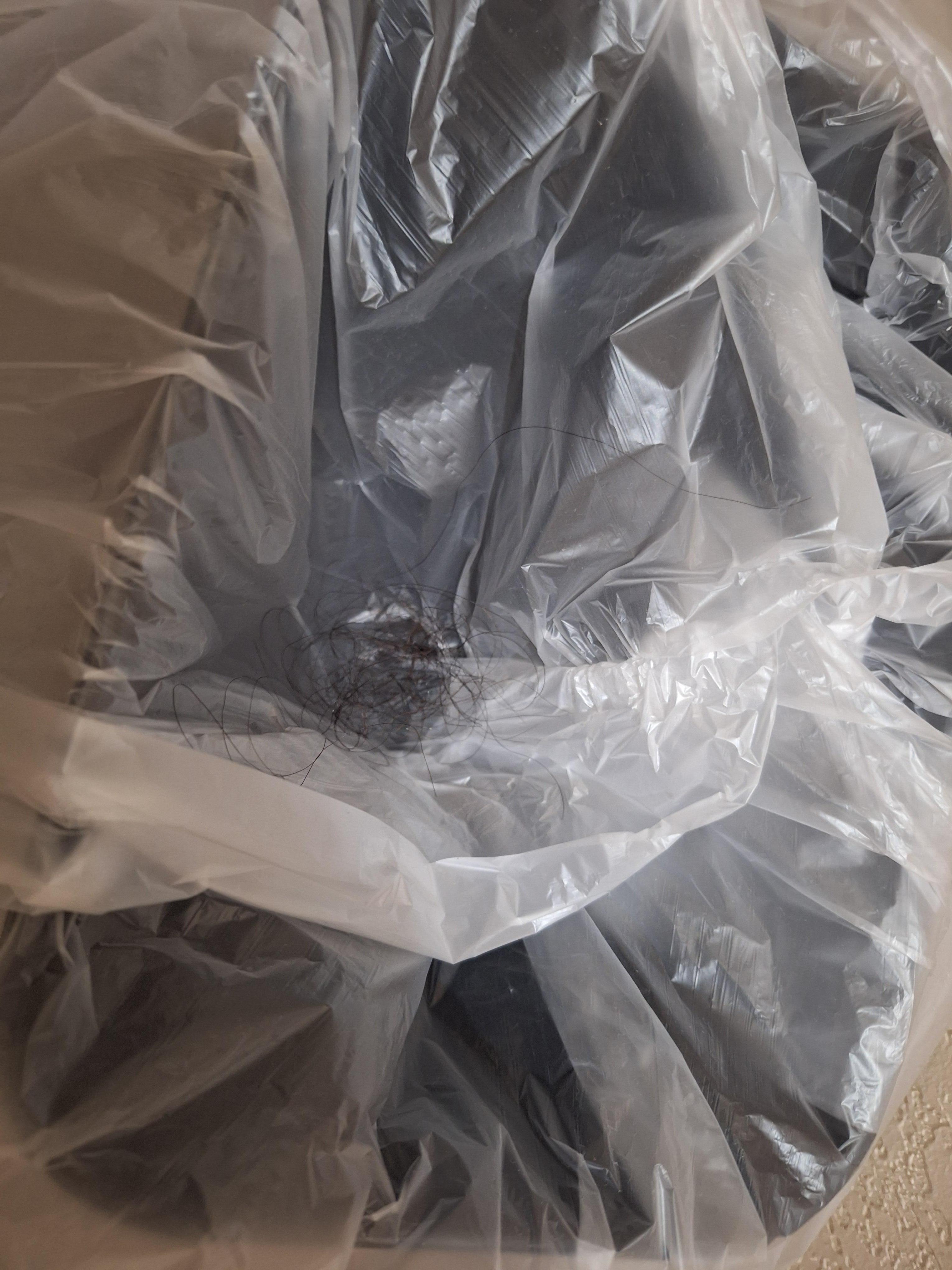 Hair in bathroom trashcan. Absolutely disgusting. 