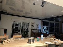 Looking from kitchen to lounge. Netting area above