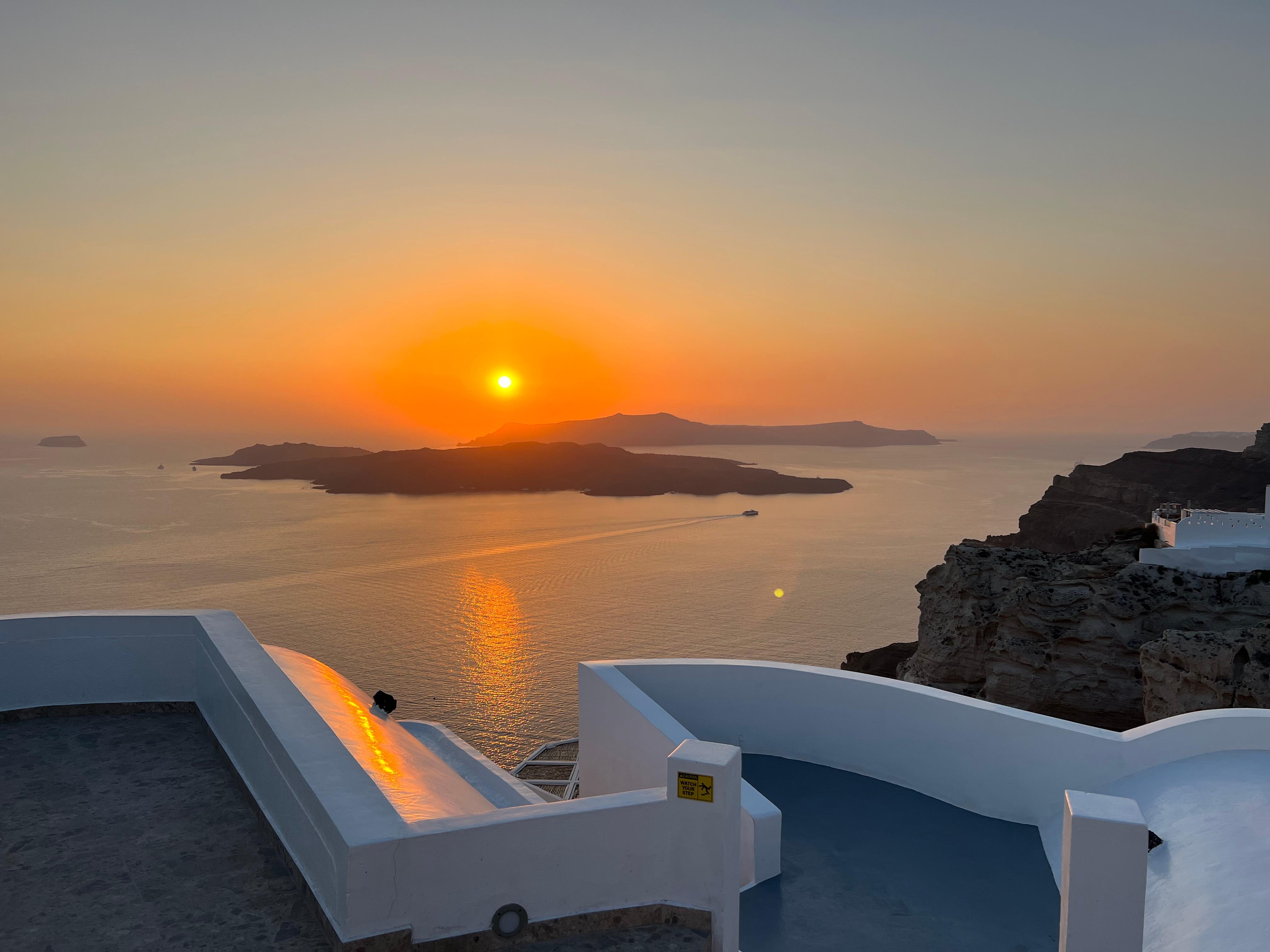 Sunset view Amity Suites Santorini Greece