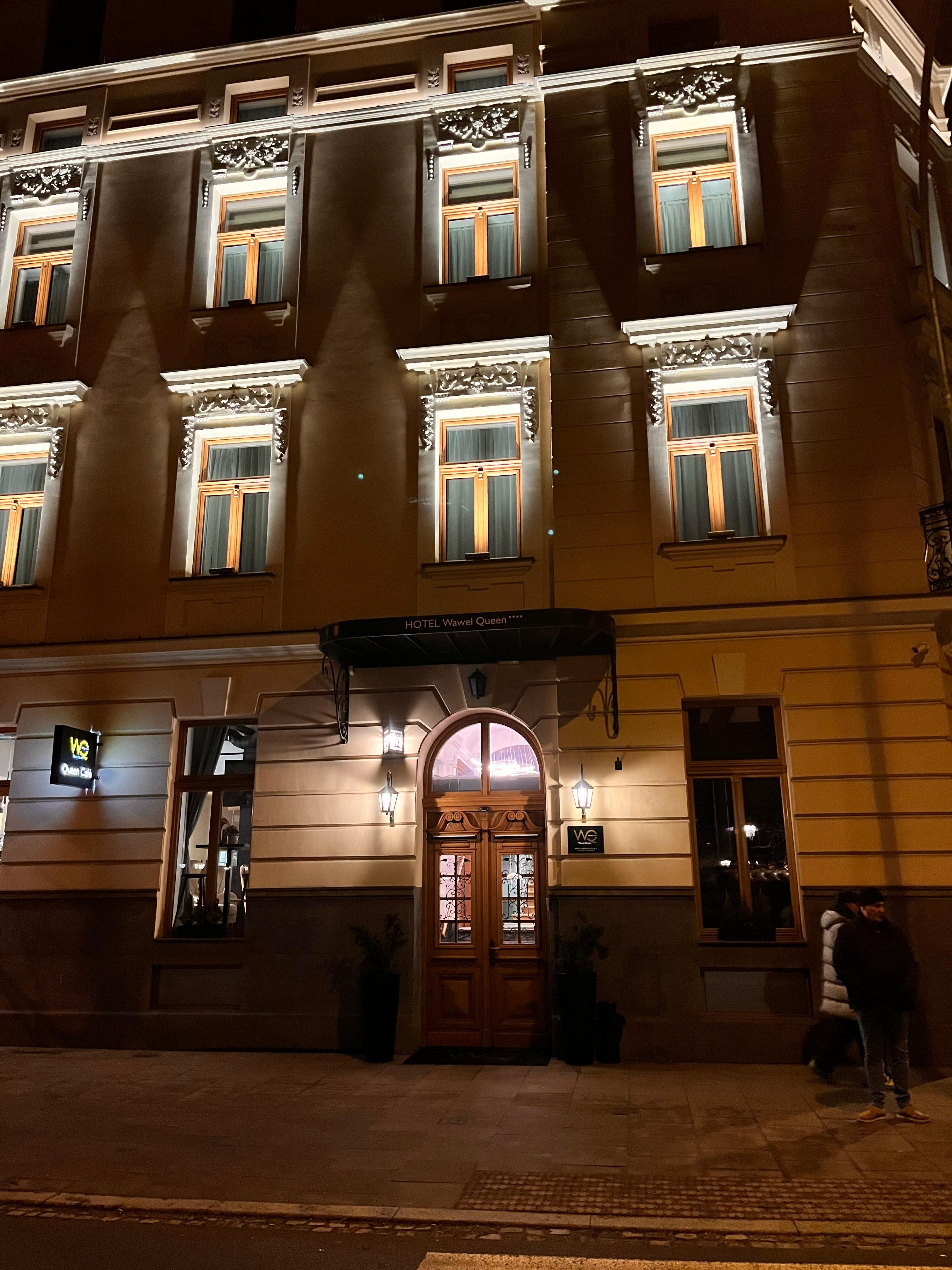 Front of hotel at night 