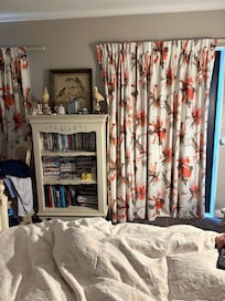 Just a curtain over door. No space.