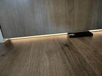 Noise from corridor due to big spacing underneath door.