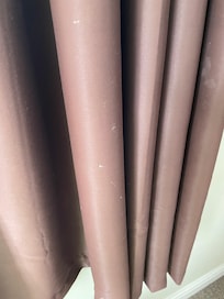 Stained worn curtains