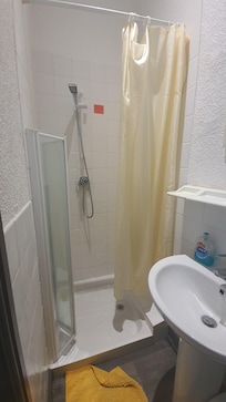 Attached bathroom and toilet.