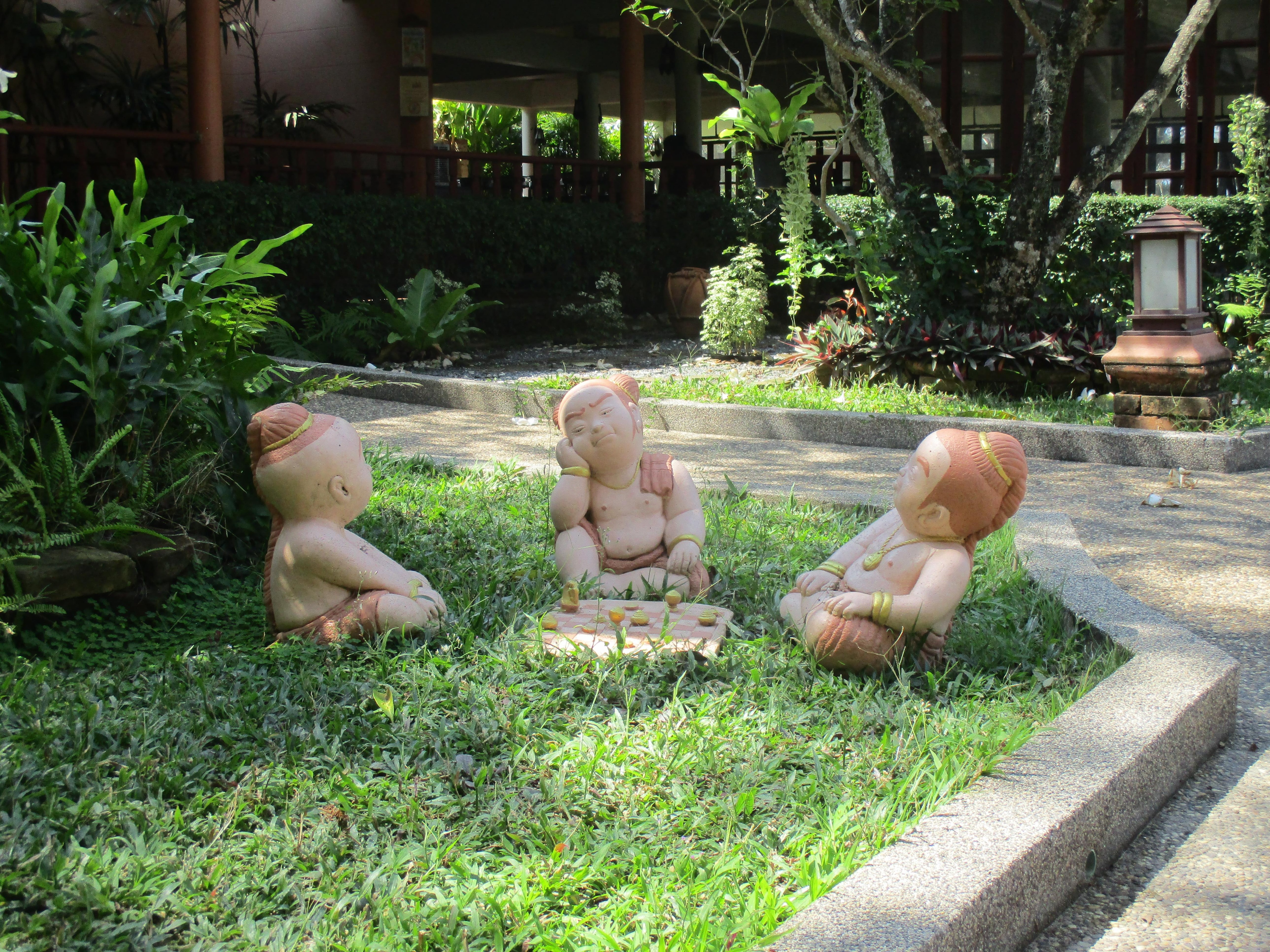 3 cheery fellows, with the dining room in the background.