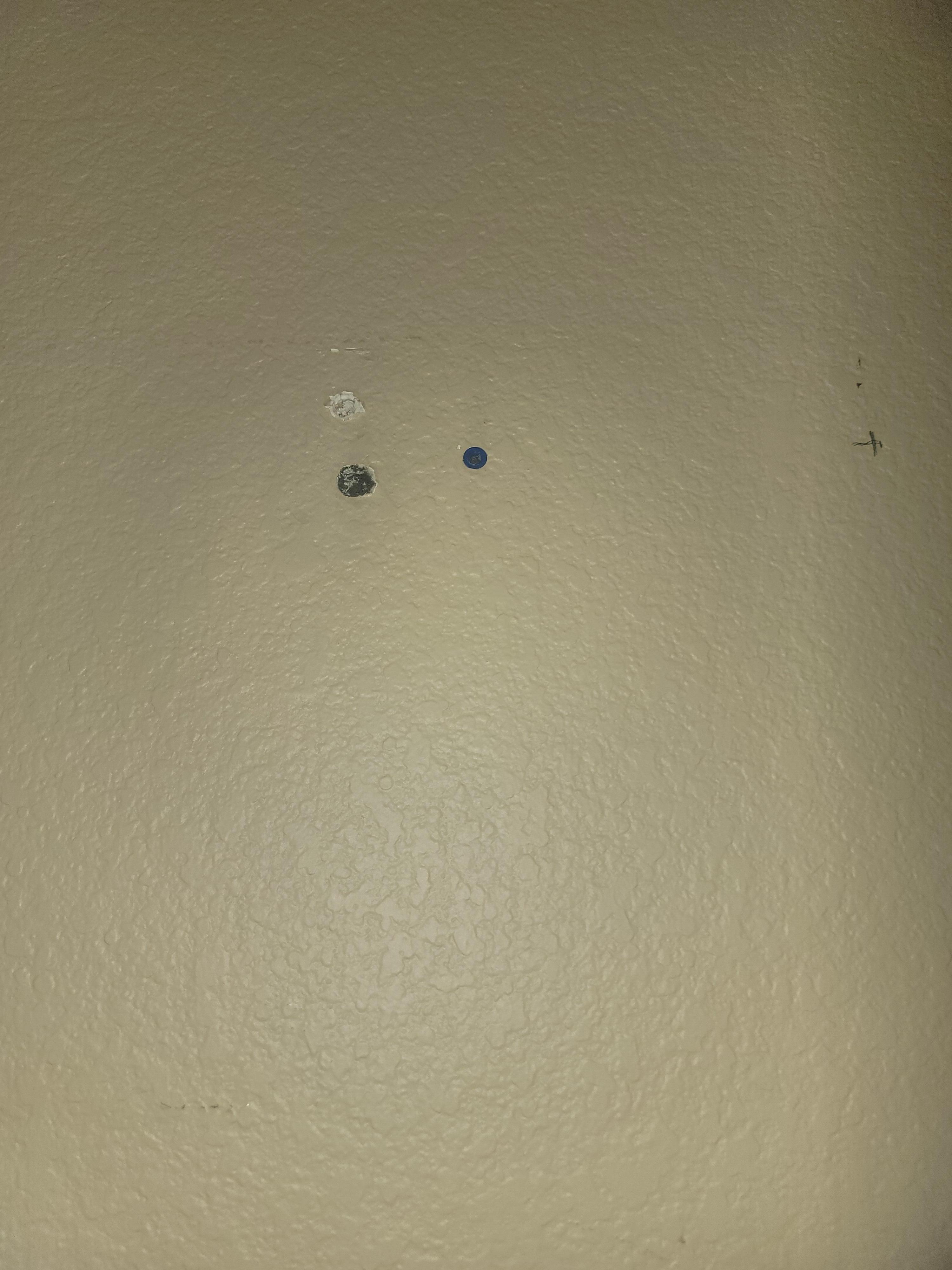 Holes in the wall are there cameras in the room I don't 