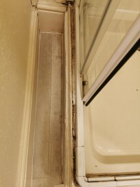 Rusty round bottom of shower