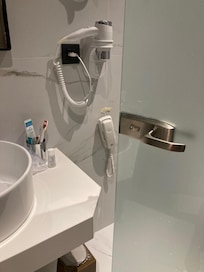 one must get past that gap to access the toilet.