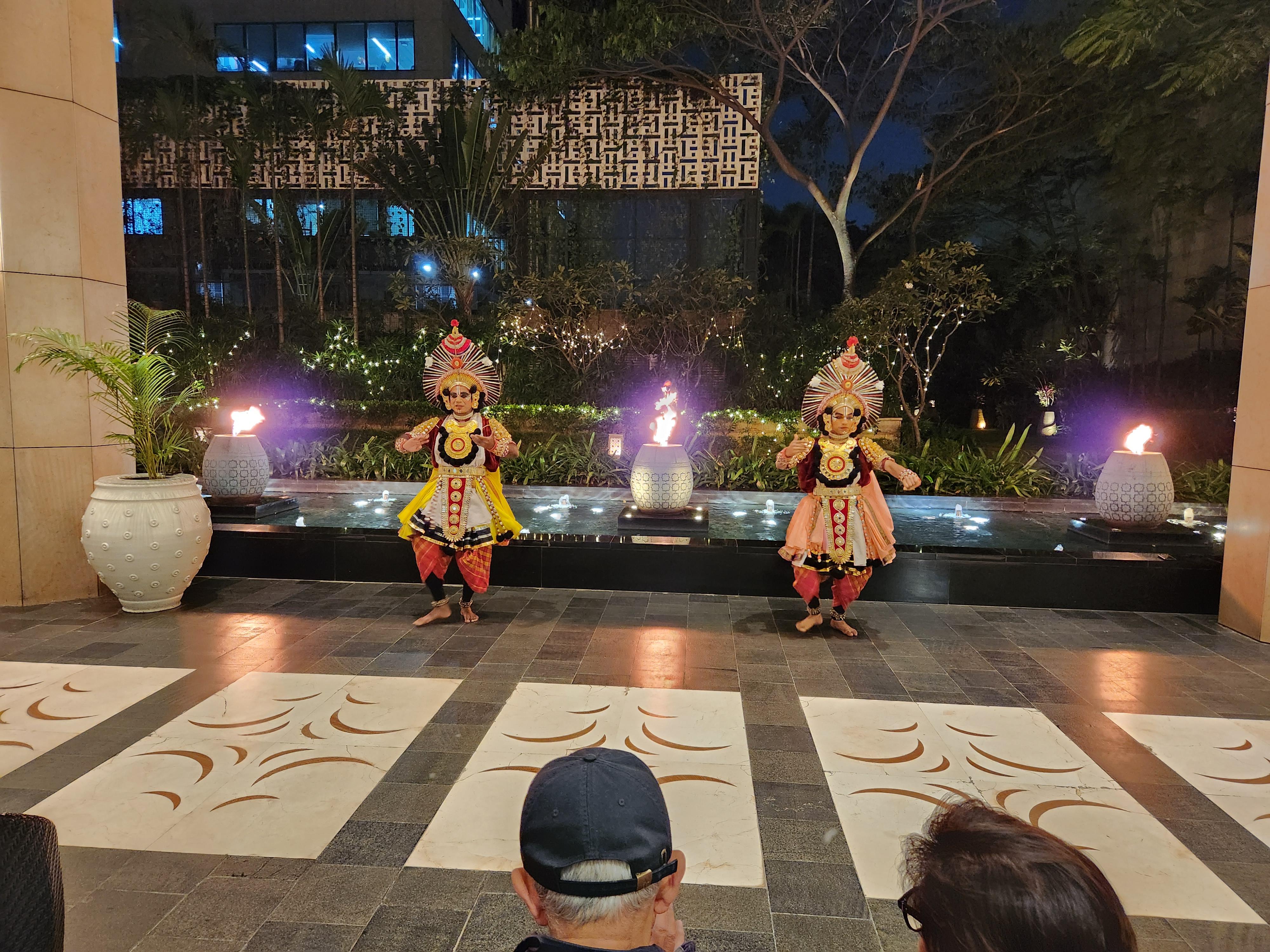 traditional dance performance near the hotel entrance